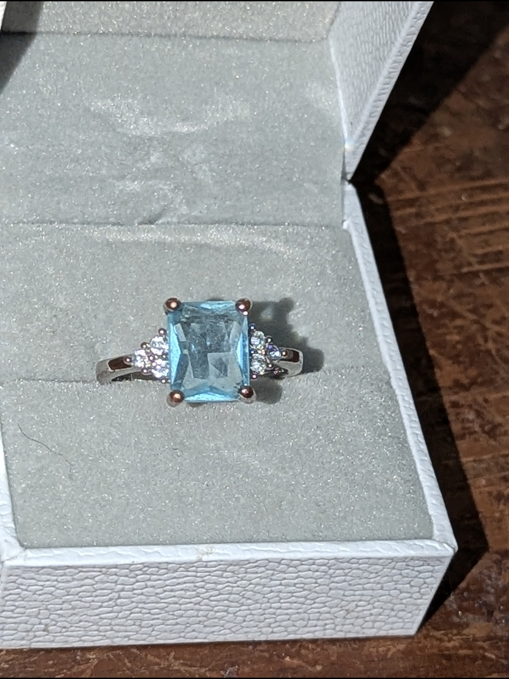 Elegant Blue Emerald-Cut Gemstone Ring with Side Accents 8.5
